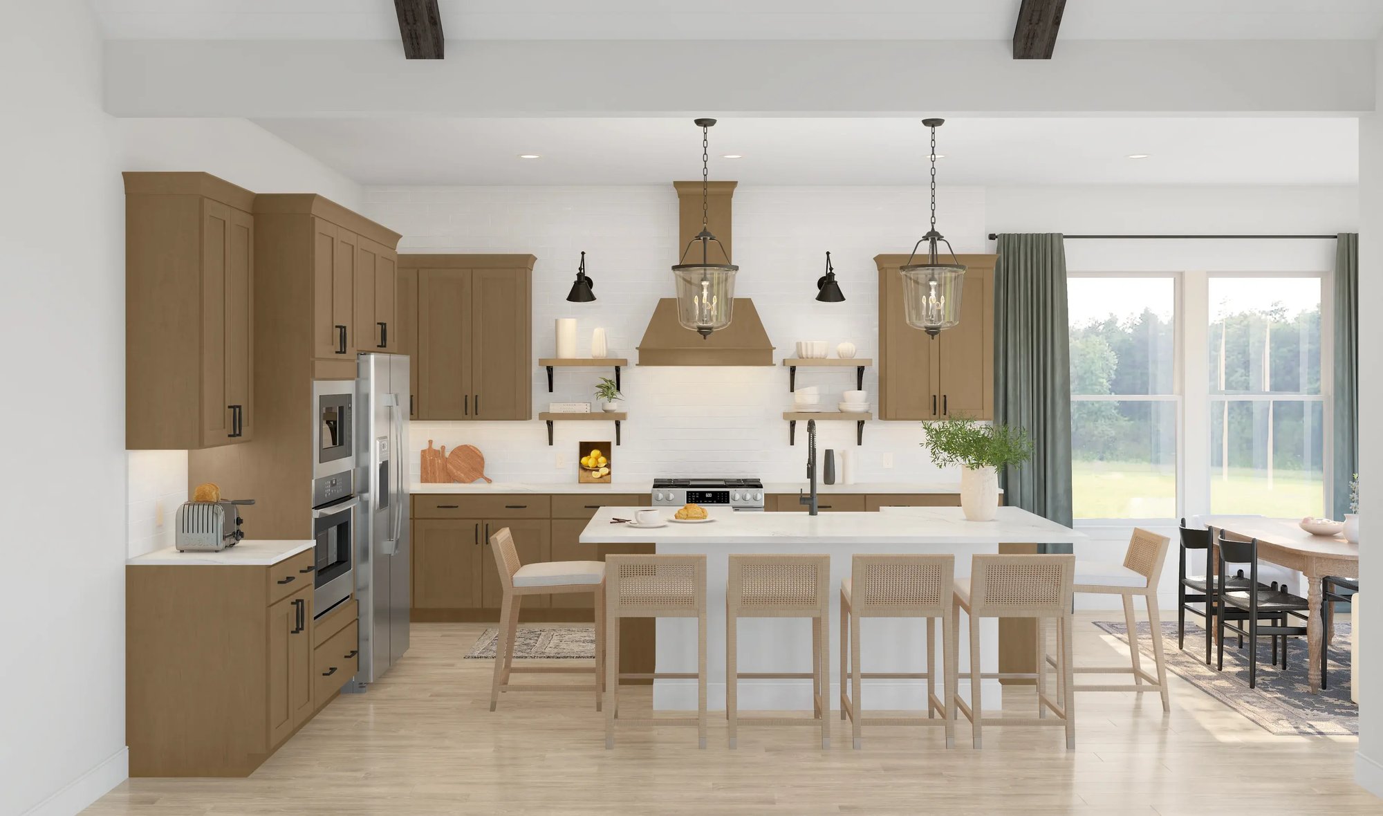 Kitchen with light oak cabinetry, black pendant lighting and an oversized island