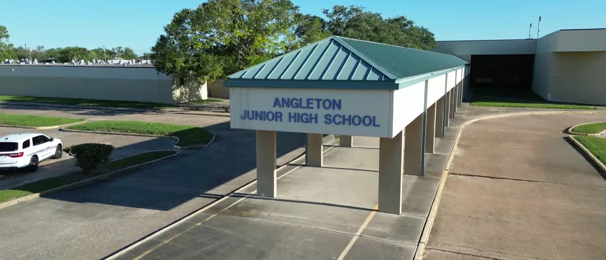 Covered main entrance of Angleton Junior High School in Angleton ISD