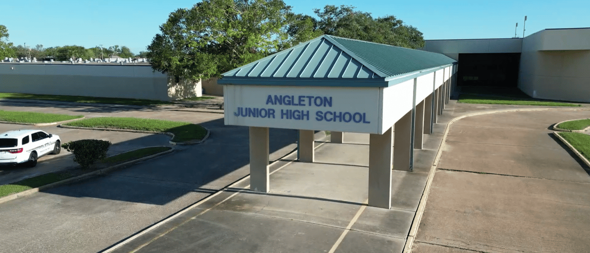 Covered main entrance of Angleton Junior High School in Angleton ISD